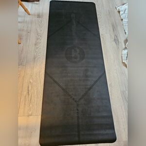 Black BUTI B Mat with Geometric Design To Keep You In Line!